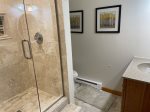 Walk-Out Basement: Bedroom w/ Queen Bed - Ensuite w/ Walk-in Shower